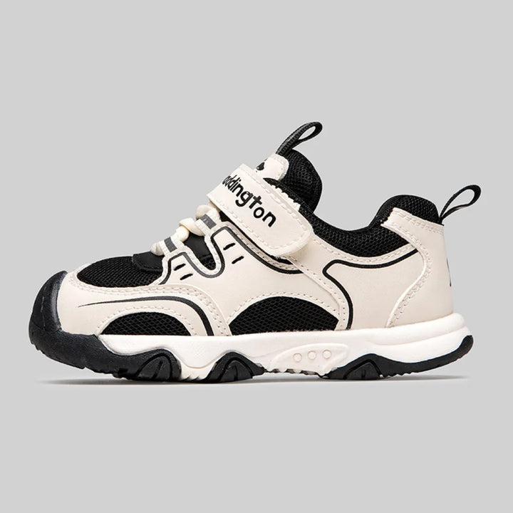 Seitliche Ansicht schwarz-beige Kinder Sneaker